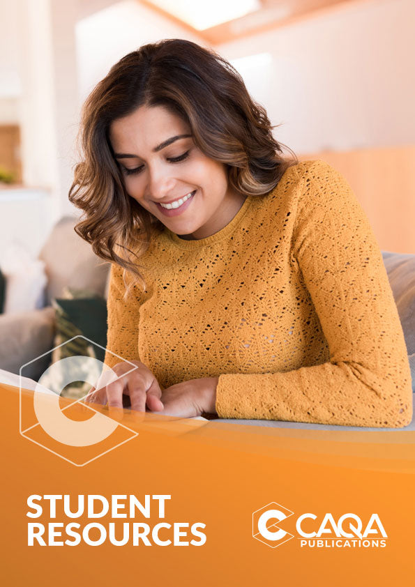 Student Resources | CAQA Publications A student studies with papers, showcasing helpful vet training resources from CAQA Publications.